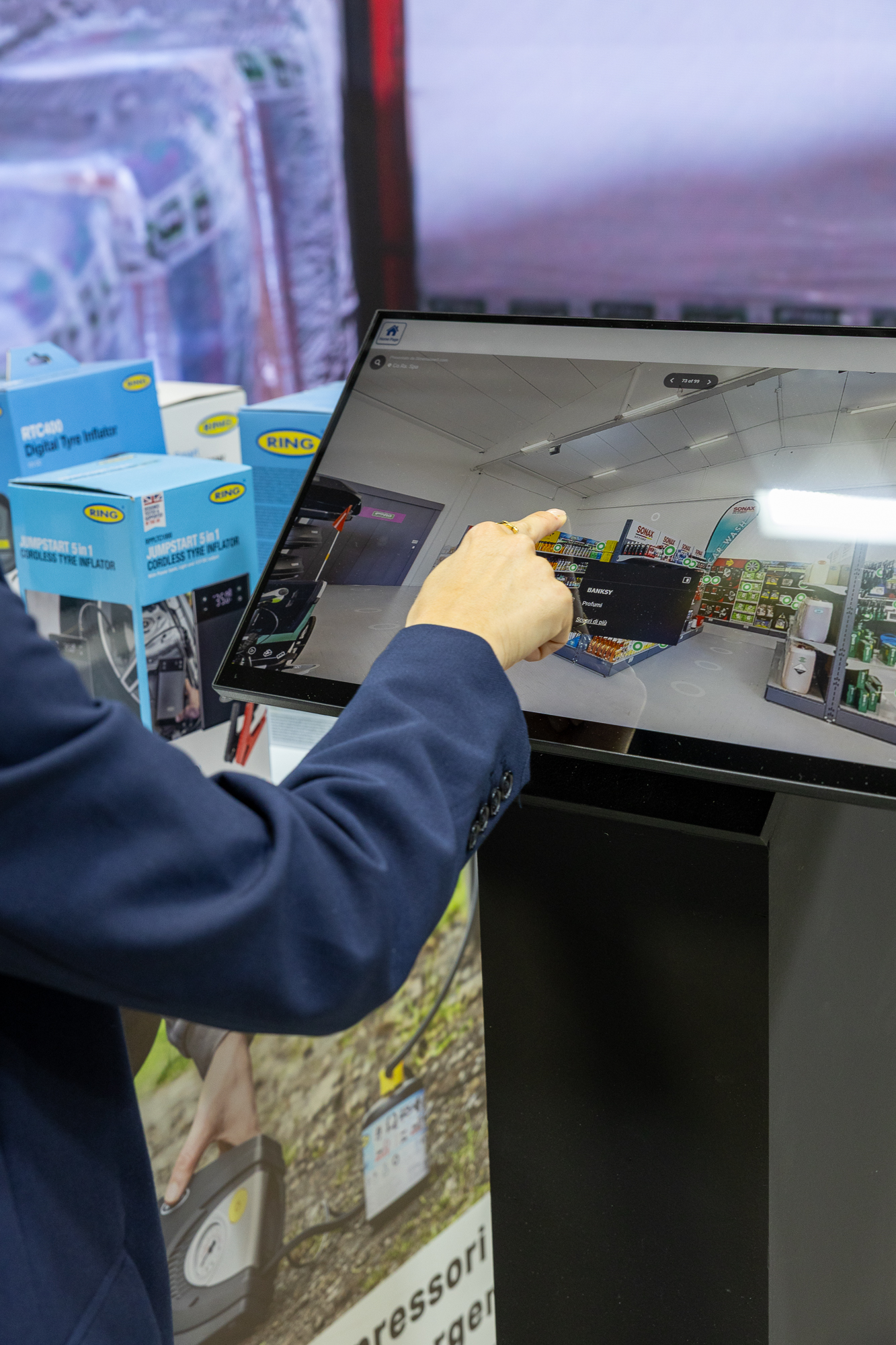 Touch screen, modern technology. Woman is using banking terminal indoors